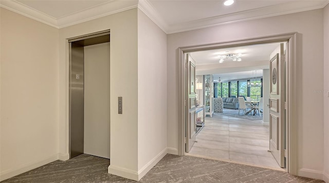 hall with elevator, crown molding, carpet, and an inviting chandelier