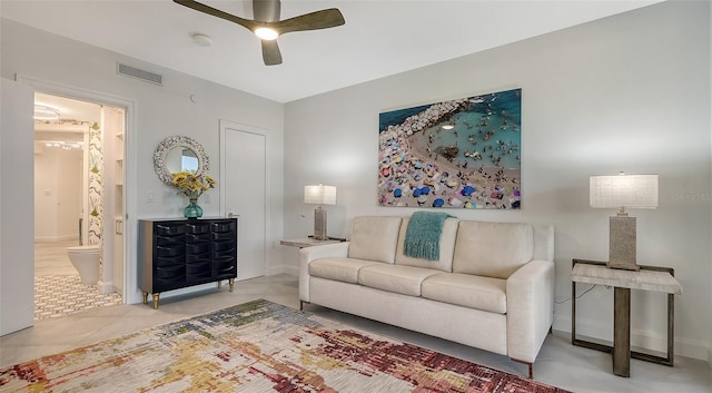 living room featuring light tile patterned floors and ceiling fan