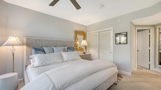 bedroom with ceiling fan and a closet