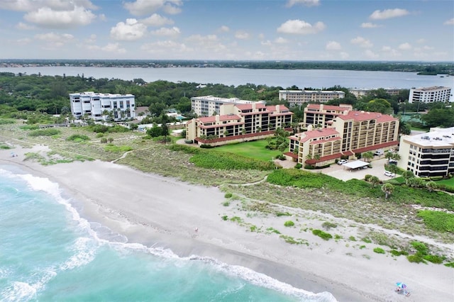 aerial view featuring a water view and a view of the beach