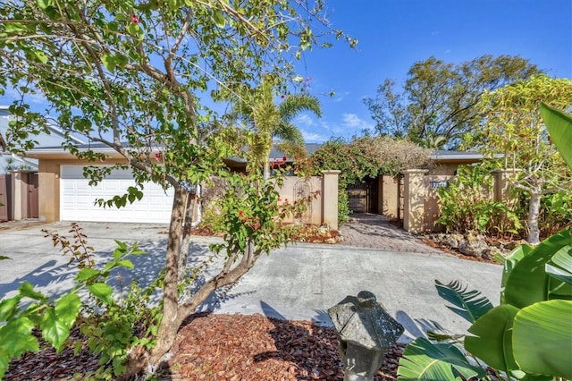 view of front of property with a garage