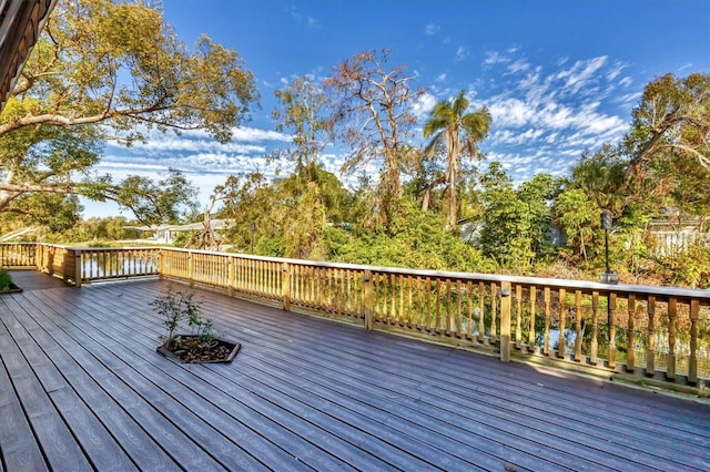 deck featuring a water view