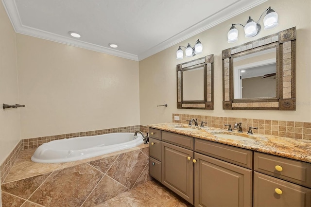 bathroom featuring crown molding, a relaxing tiled tub, vanity, and decorative backsplash