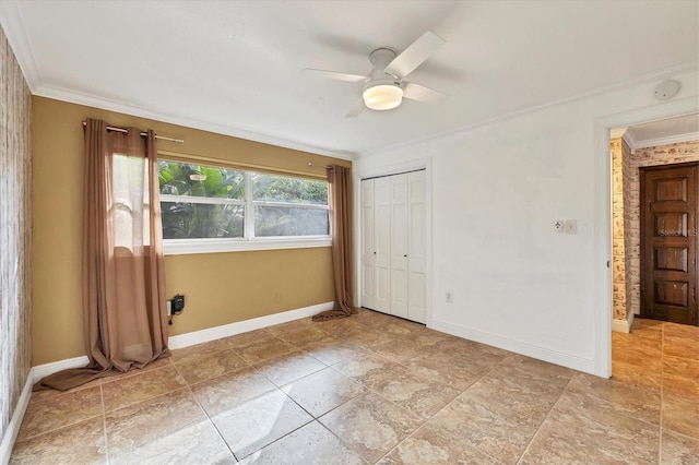 unfurnished room featuring ceiling fan and ornamental molding