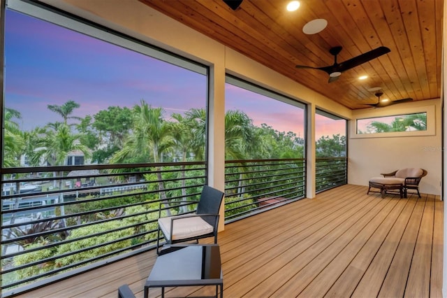 sunroom / solarium featuring wooden ceiling