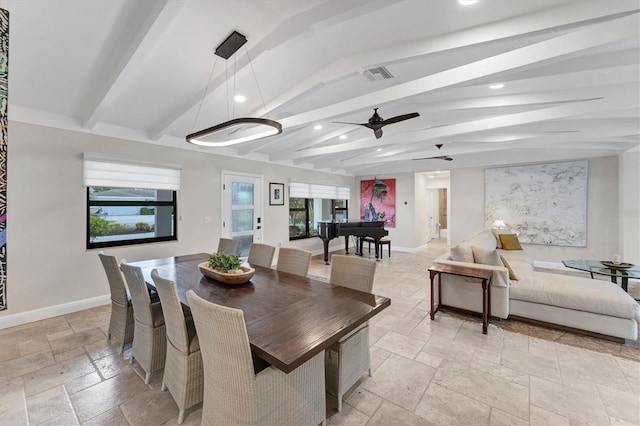 dining room with vaulted ceiling with beams and ceiling fan