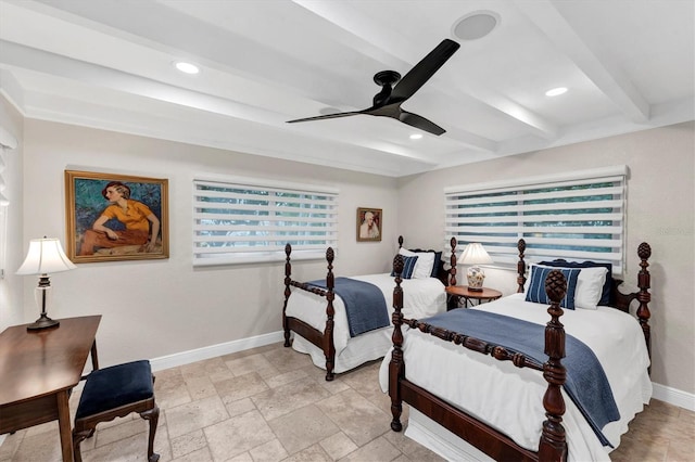 bedroom with beamed ceiling and ceiling fan