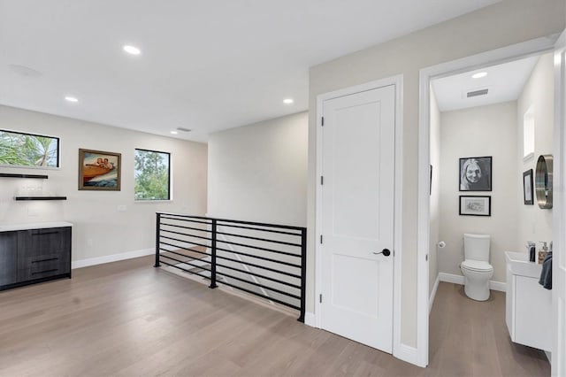 hall featuring light hardwood / wood-style flooring