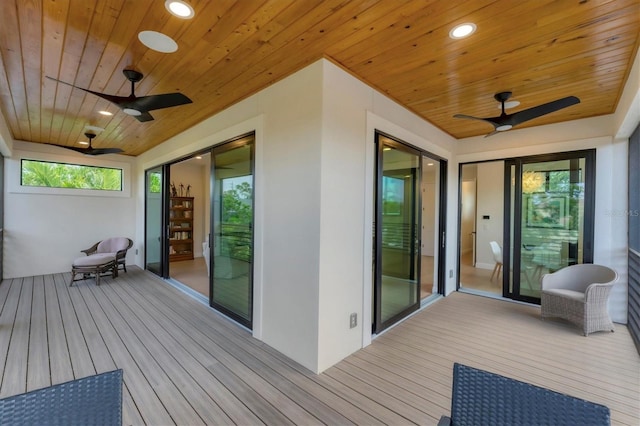 wooden terrace with ceiling fan