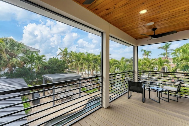 sunroom with wooden ceiling