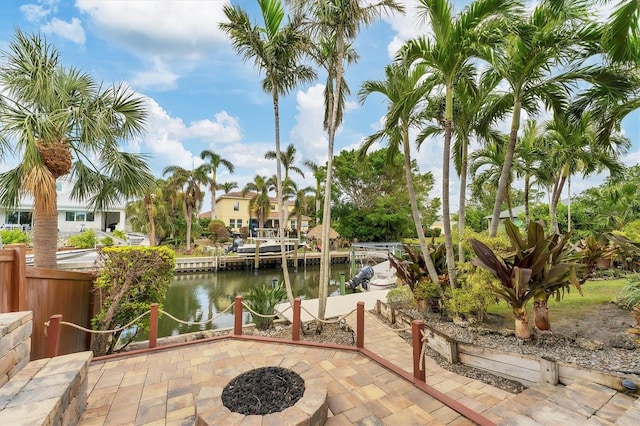 view of patio with a water view