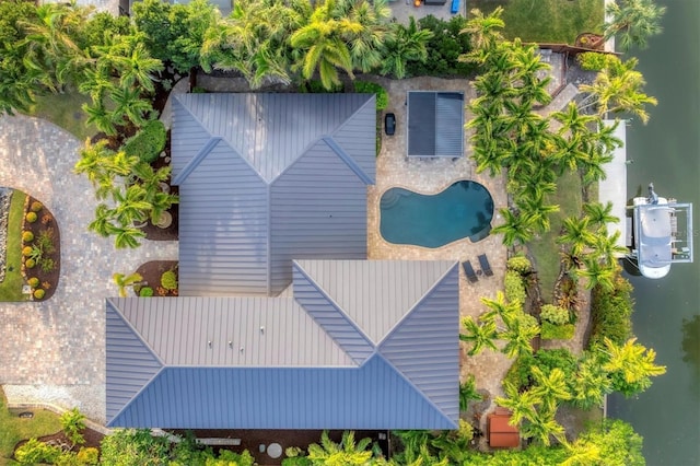 birds eye view of property featuring a water view