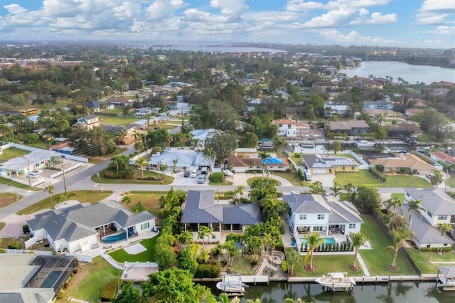 drone / aerial view with a water view