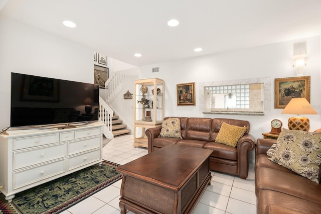 living room with light tile patterned flooring