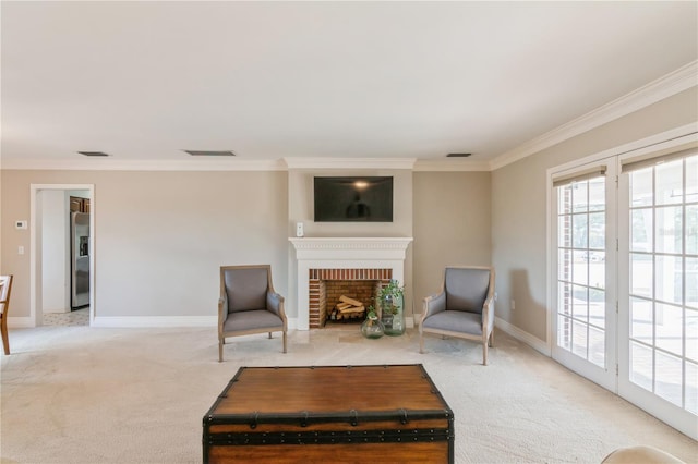 sitting room featuring a fireplace, ornamental molding, and light carpet