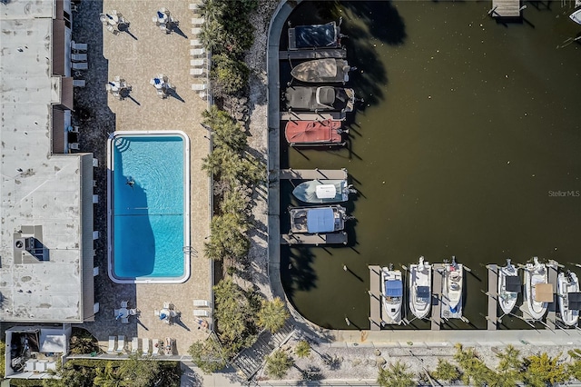 bird's eye view with a water view