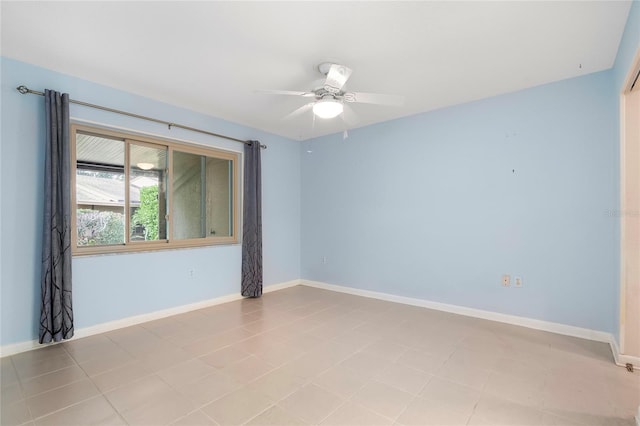 spare room with ceiling fan