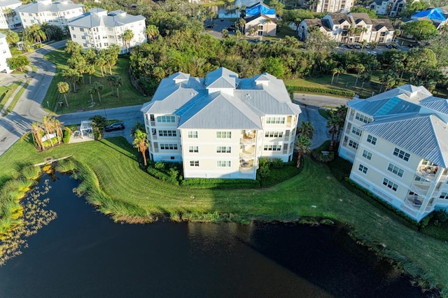 drone / aerial view with a water view