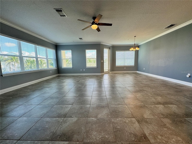 empty room featuring a textured ceiling, ceiling fan with notable chandelier, and ornamental molding