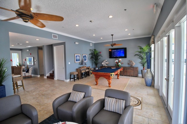 playroom featuring ceiling fan, ornamental molding, a textured ceiling, and billiards