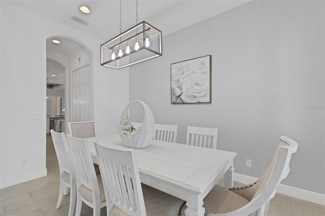 dining room with light wood-type flooring