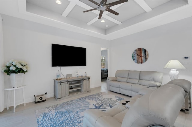 living room with ceiling fan, beam ceiling, and coffered ceiling