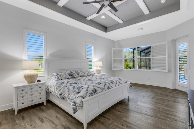 bedroom featuring access to exterior, ceiling fan, and dark wood-type flooring