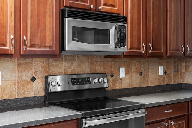 kitchen featuring backsplash and appliances with stainless steel finishes