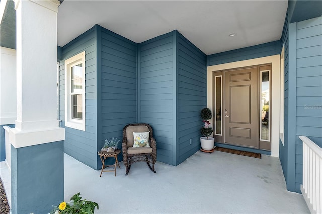 property entrance with a porch