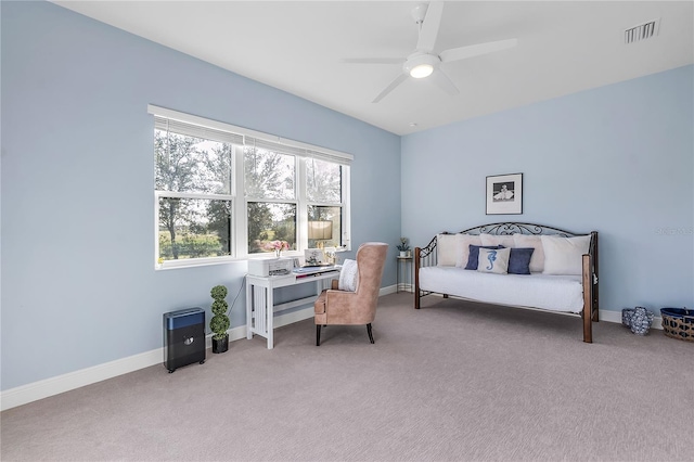 bedroom featuring ceiling fan and carpet floors