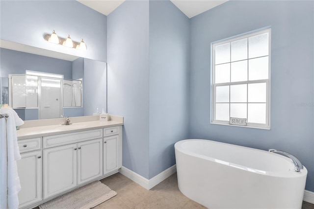 bathroom featuring separate shower and tub, tile patterned flooring, vanity, and a healthy amount of sunlight