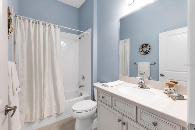 full bathroom with toilet, tile patterned floors, vanity, and shower / tub combo with curtain