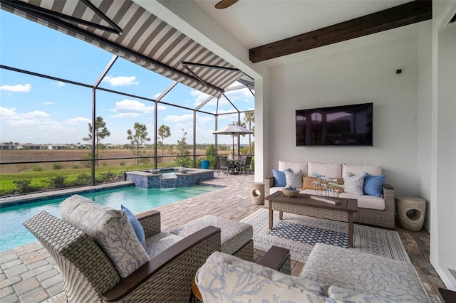 view of swimming pool with a lanai, a patio area, an in ground hot tub, and an outdoor hangout area