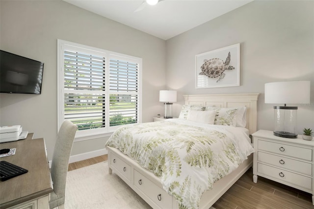 bedroom featuring ceiling fan and light wood-type flooring