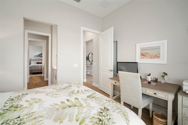 bedroom featuring hardwood / wood-style floors