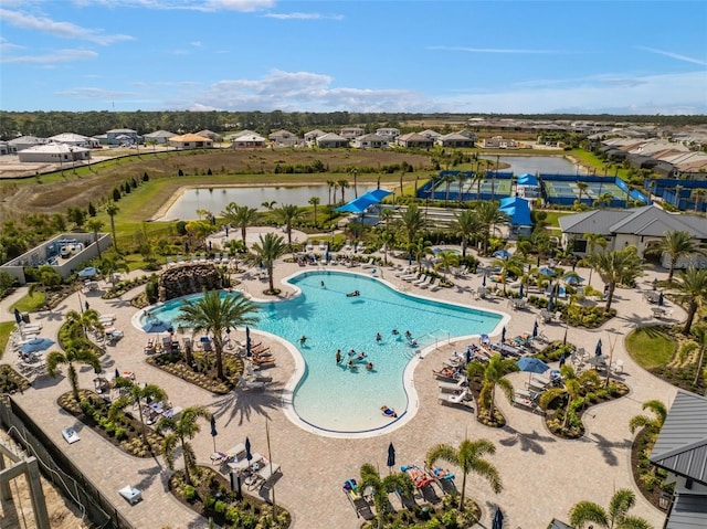 bird's eye view with a water view