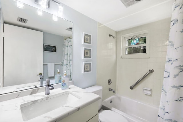 full bathroom featuring vanity, toilet, and shower / bathtub combination with curtain