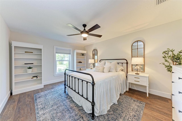 bedroom featuring hardwood / wood-style flooring and ceiling fan