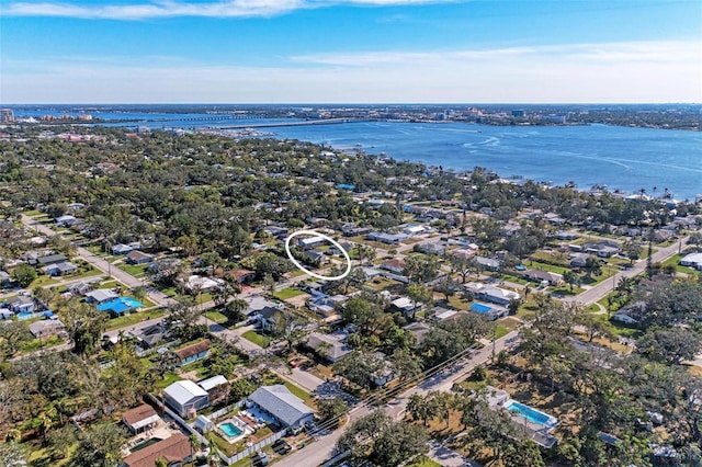 bird's eye view with a water view