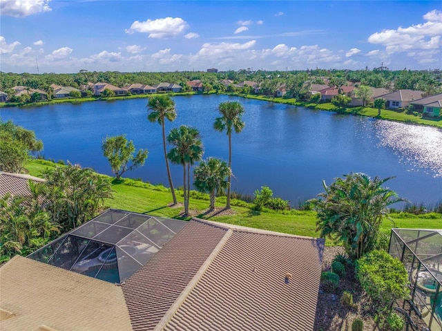 birds eye view of property featuring a water view