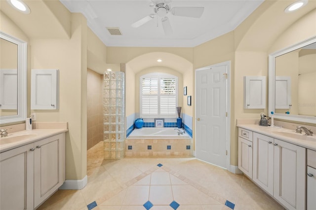 bathroom featuring plus walk in shower, vanity, tile patterned floors, and ceiling fan