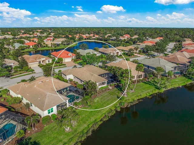 birds eye view of property featuring a water view