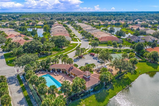 birds eye view of property featuring a water view