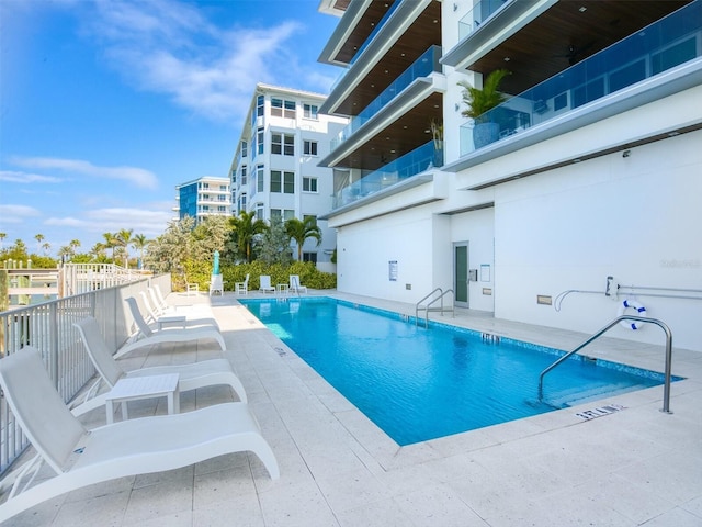 view of pool featuring a patio