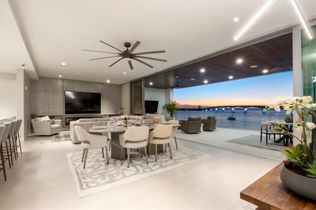 dining space featuring ceiling fan