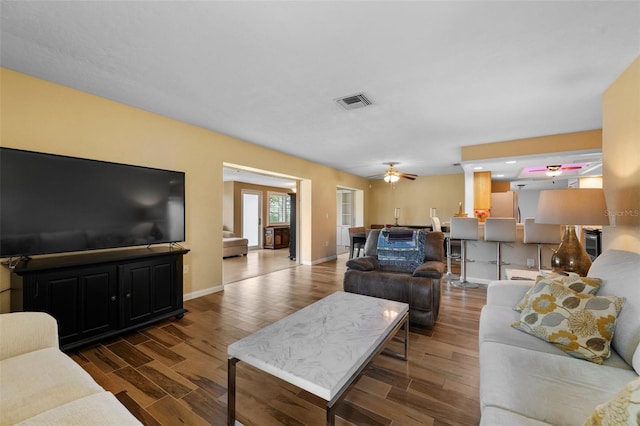 living room with ceiling fan