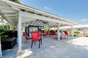 view of patio / terrace featuring ceiling fan