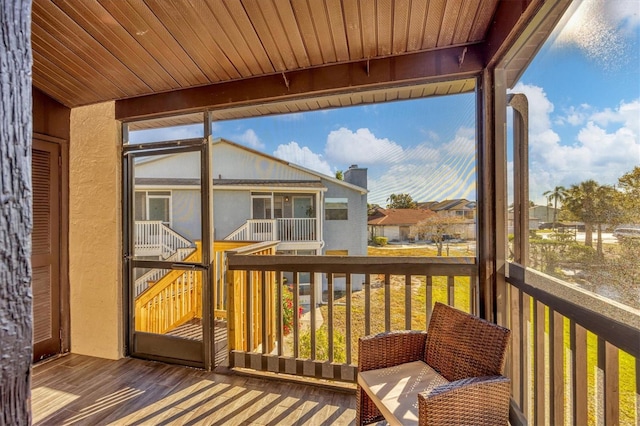 sunroom / solarium with vaulted ceiling and wood ceiling