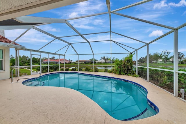 view of swimming pool featuring a water view, a patio area, and a lanai