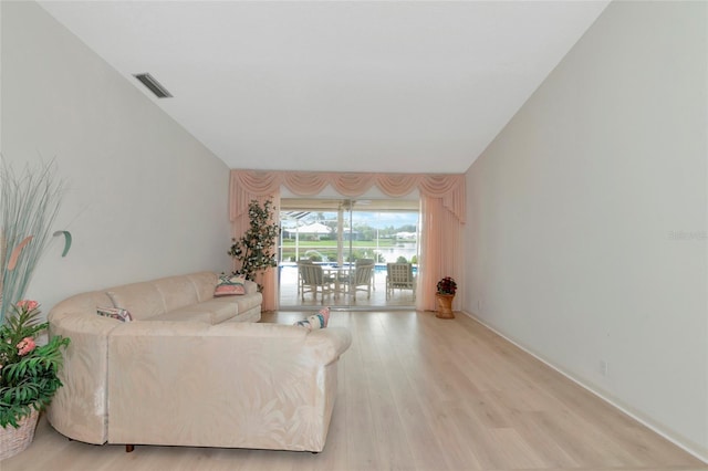 living room with light hardwood / wood-style floors